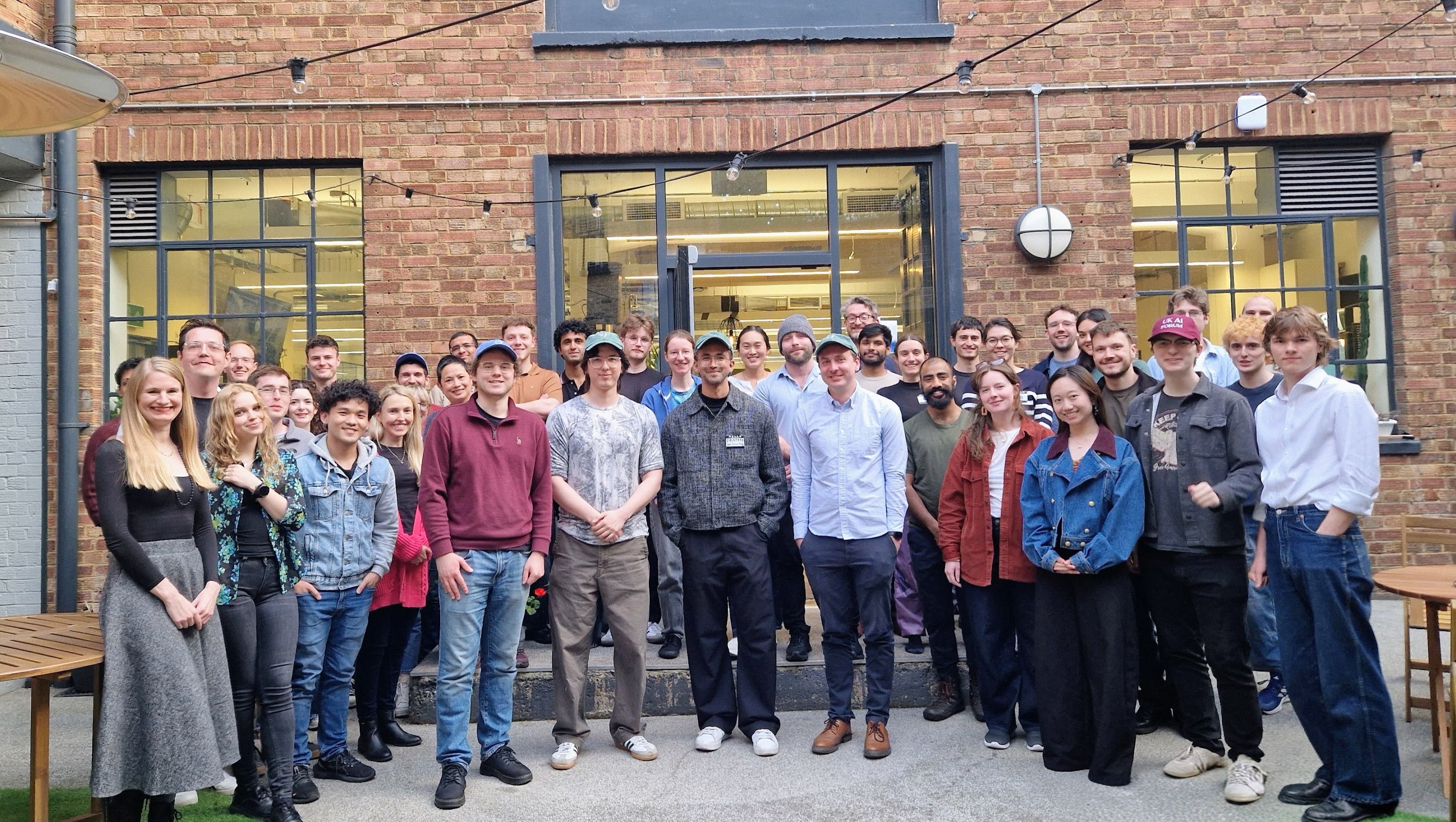 The full AI x Bio Hackathon cohort outside LISA in London