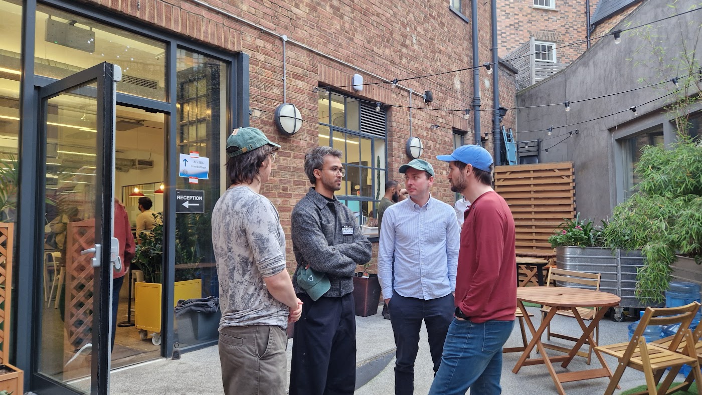 Builders chatting in the courtyard after demos